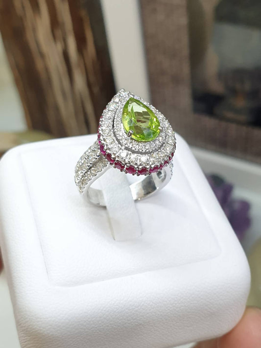 Custom Peridot Birthstone Ring with Diamonds & Rubies – 9K White Gold