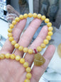 Yellow Jade Beaded Bracelet: Happy Buddha Charm, Natural Jadeite (17 cm)